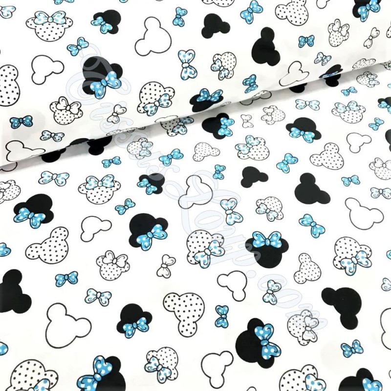 Tela de algodón Cabezas de Minnie Mouse lazo azul turquesa | Telas Lobo
