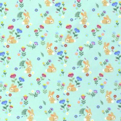 Tela Jersey algodón de Conejos y flores fondo turquesa claro | Telas Lobo